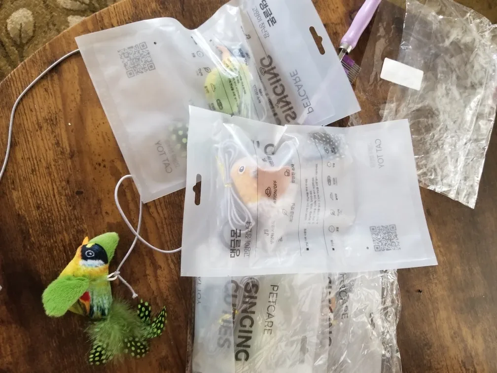 Cat toy chirping bird on string brand new image indicator(3)