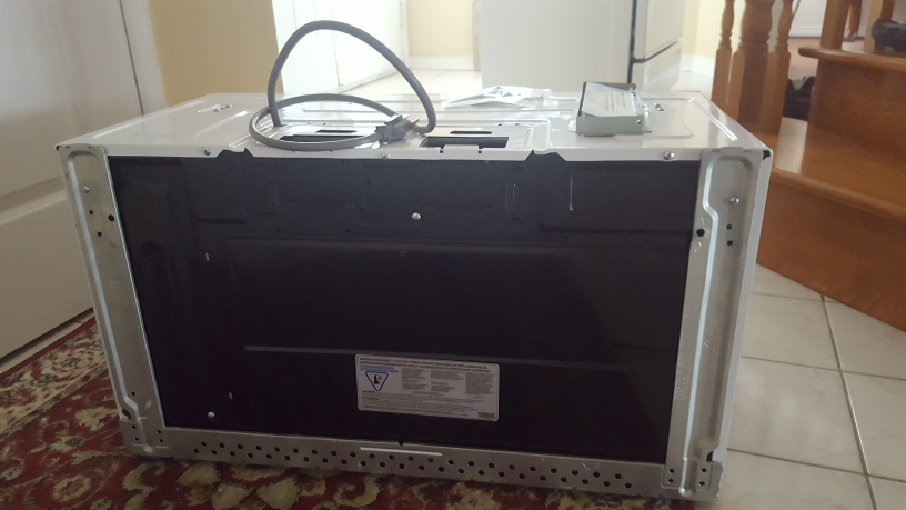 GE Over-the-Range Microwave - White - photo 4