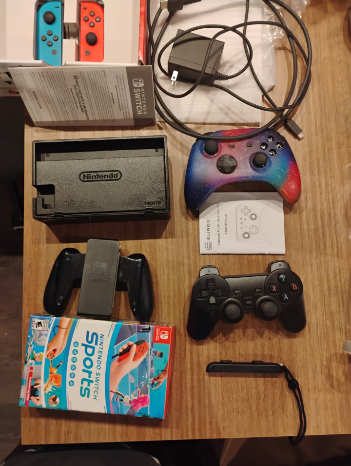 Nintendo Switch Console with Games and Accessories - photo 2