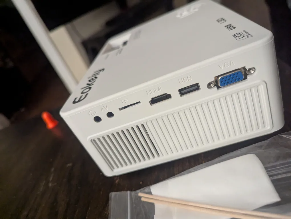 Mini projector like new with box and accessories image indicator(4)