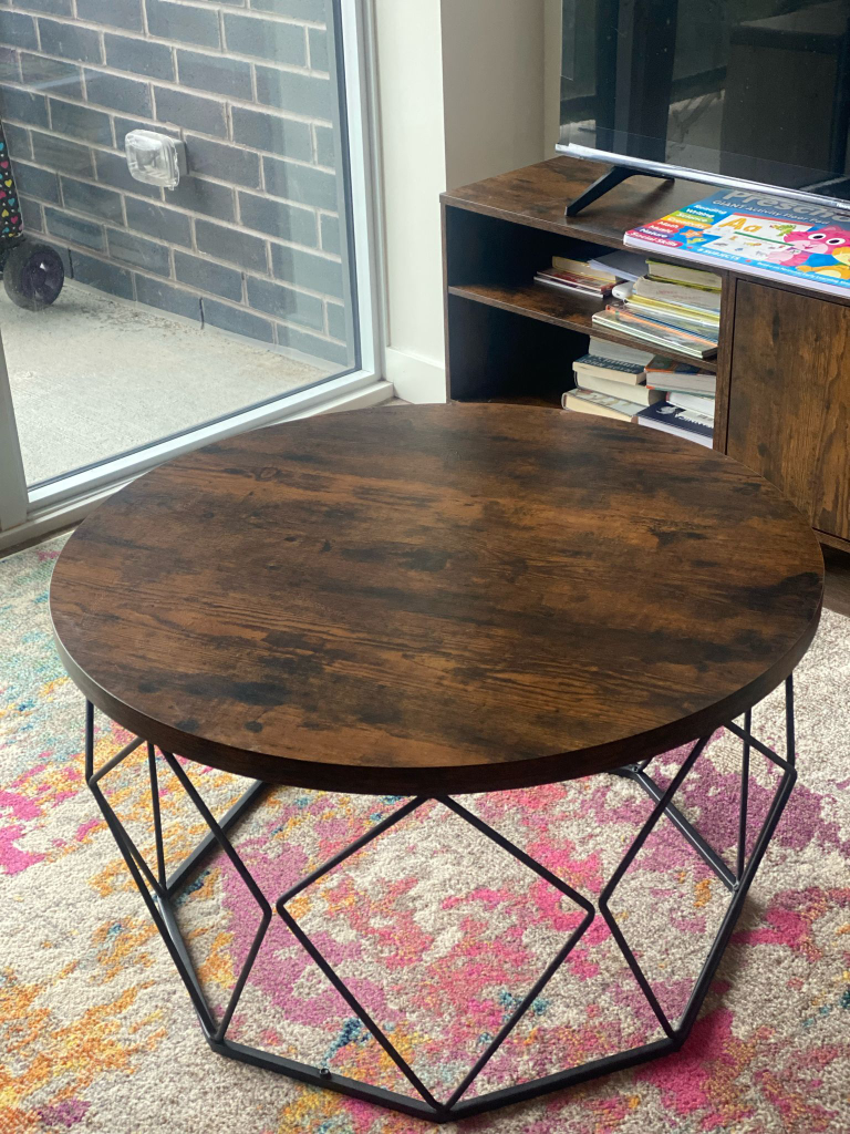 Round Coffee Table with Geometric Metal Base