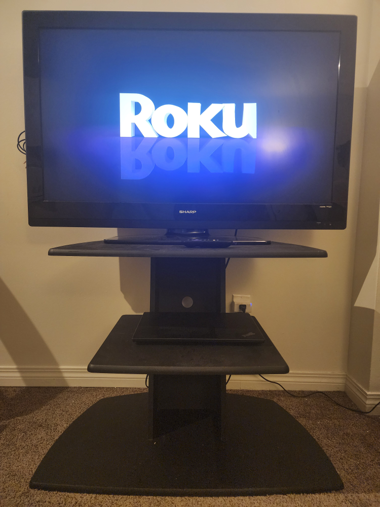 Sharp TV with Samsung Soundbar and Stand - photo 5