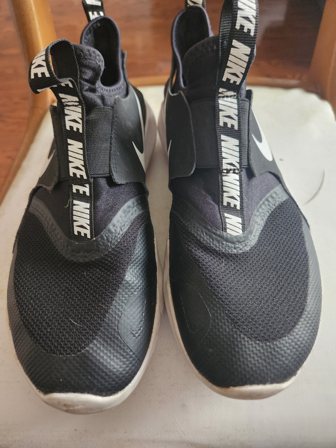 Nike slip-on sneakers, size 6