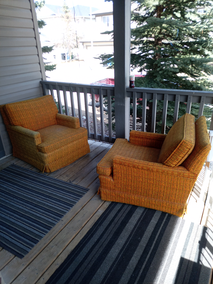 Pair of Vintage Orange Swivel Armchairs