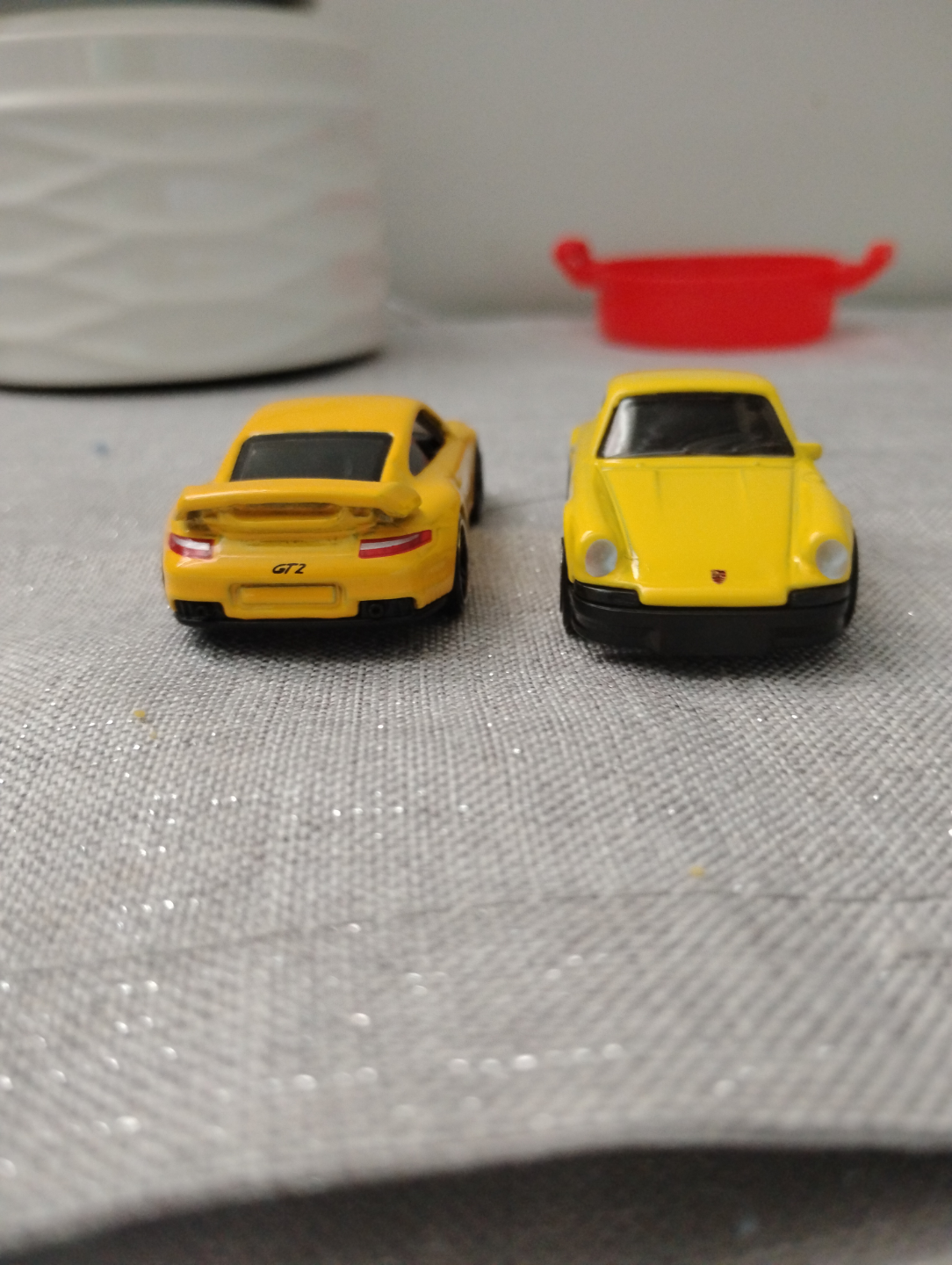 Pair of Yellow Porsche Die-Cast Model Cars