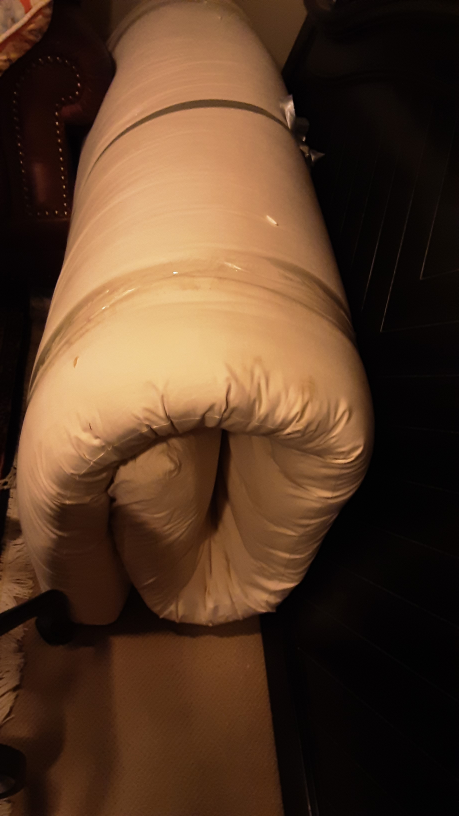 Rolled-up Mattress Topper