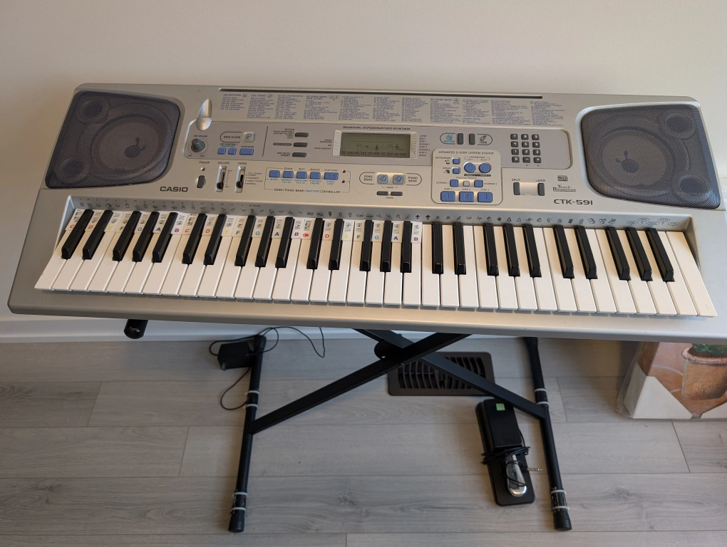 Casio CTK-591 Keyboard with Stand and Sustain Pedal | Karrot