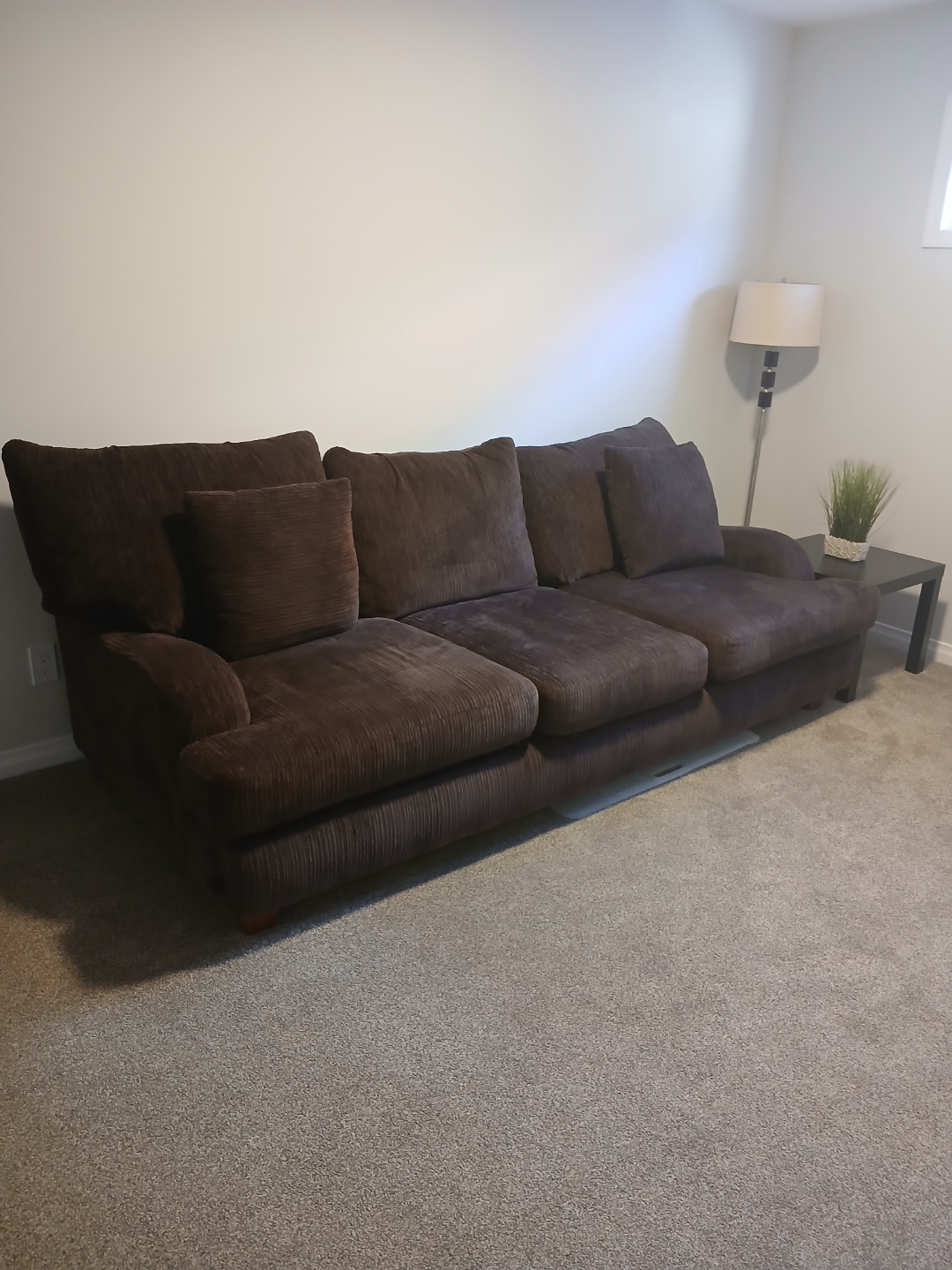 Brown corduroy sofa