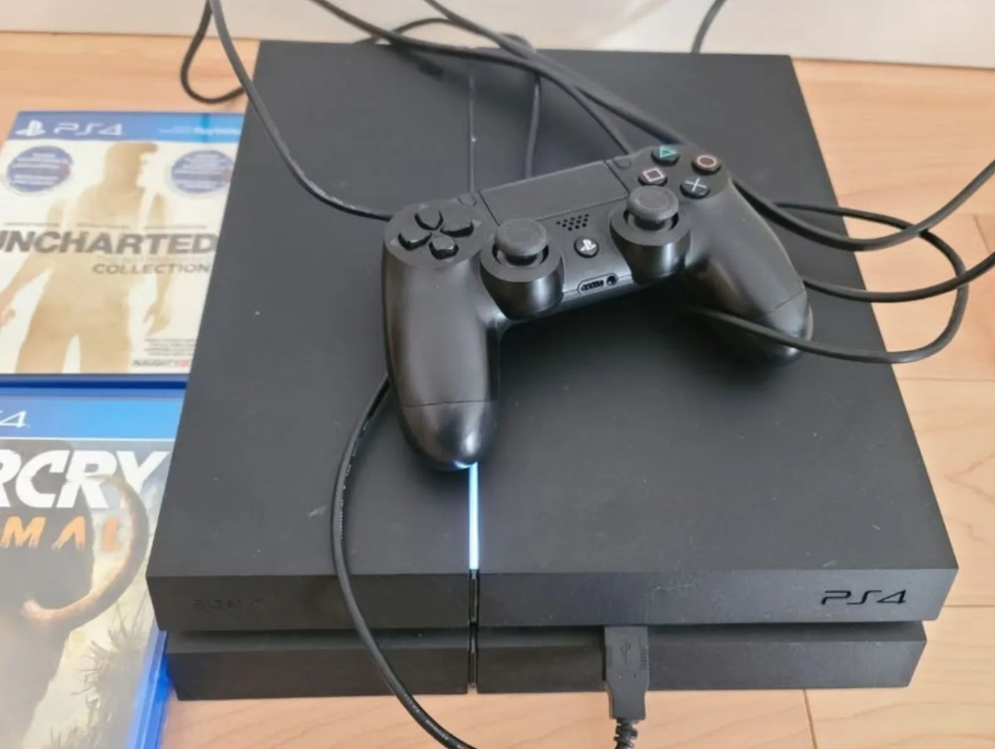 PS4 Console with 2 Games - Uncharted Collection & Far Cry Primal image indicator(3)