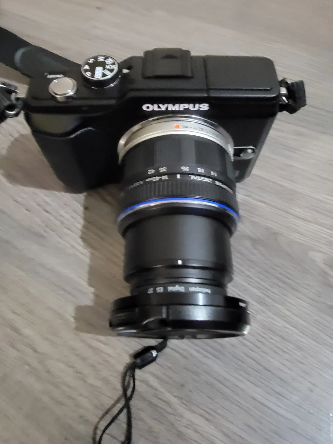 Olympus PEN E-PL2 Mirrorless Camera with Lenses and Accessories image indicator(2)