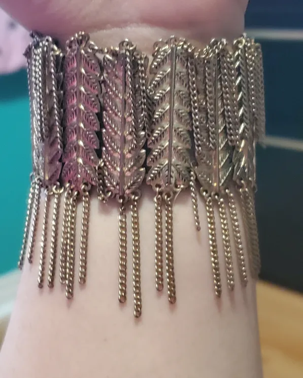 Gold Statement Bracelet with Leaf and Chain Detail image indicator(2)