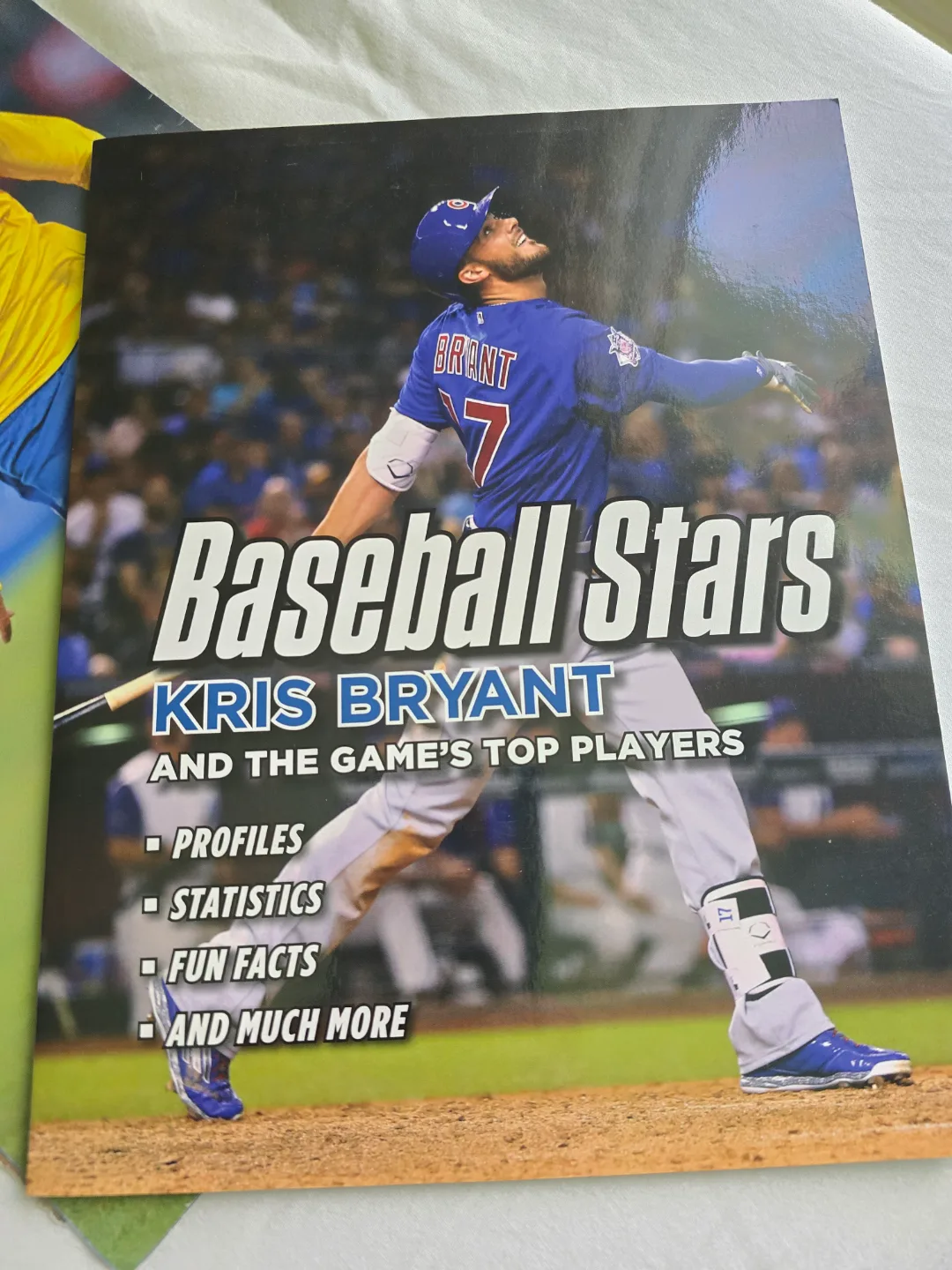 assorted sport posters, cards, pucks and games image indicator(9)