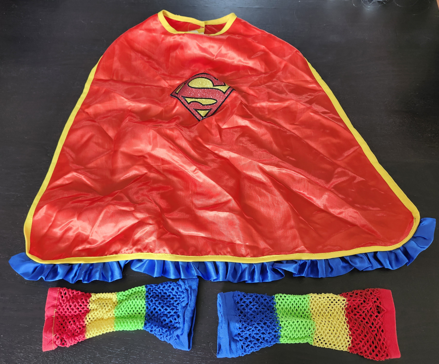 Girls Supergirl cape & arm bands. Pick up in Kitchener, $10