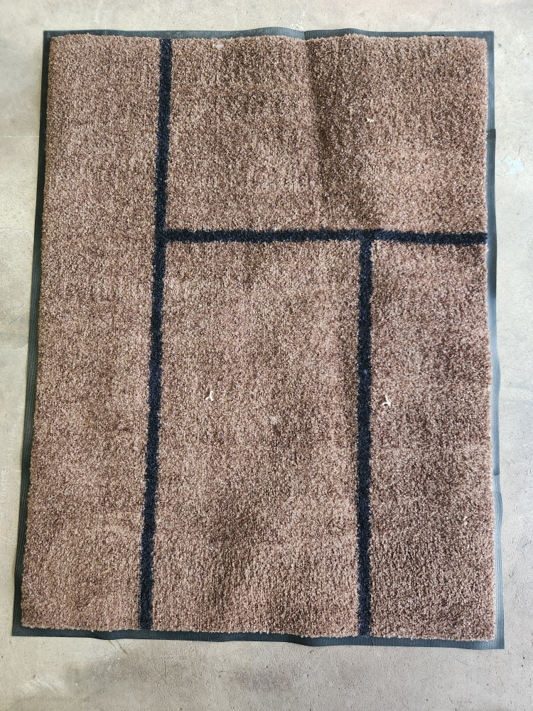 Brown patterned floor mat