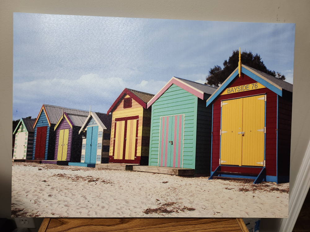 Brightly Coloured Beach Huts Canvas Print💚