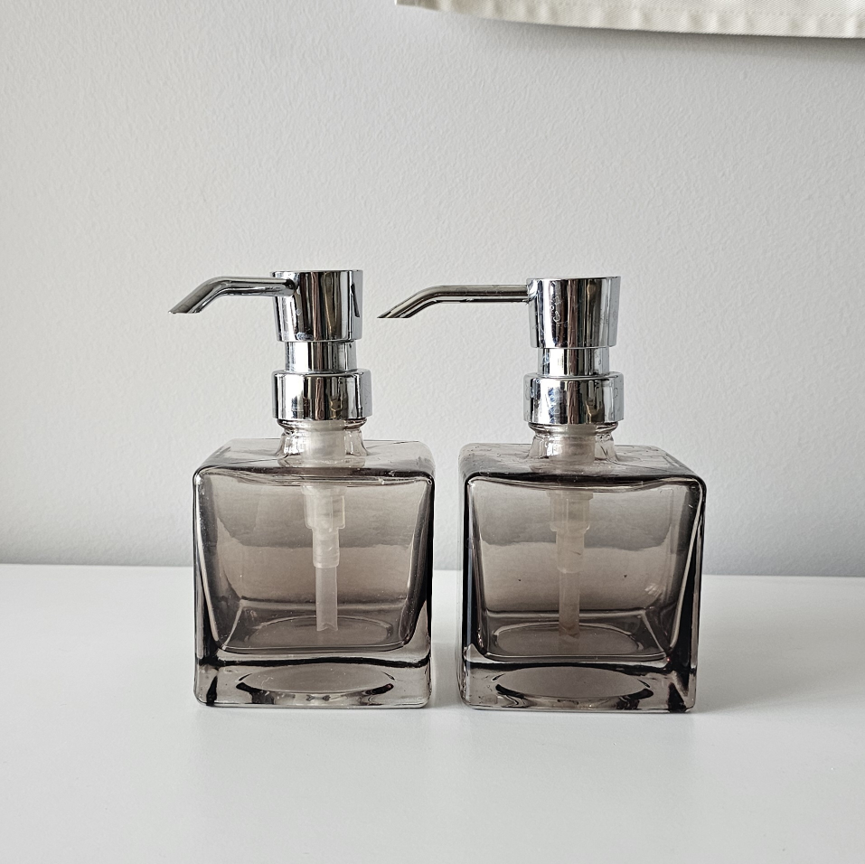 Pair of Smoke Grey Glass Soap Dispensers with Chrome Pumps