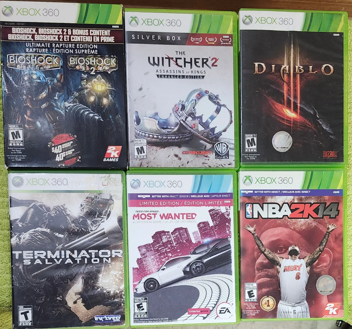 X box 360 e with all wires and wireless controller and 22 games image indicator(7)