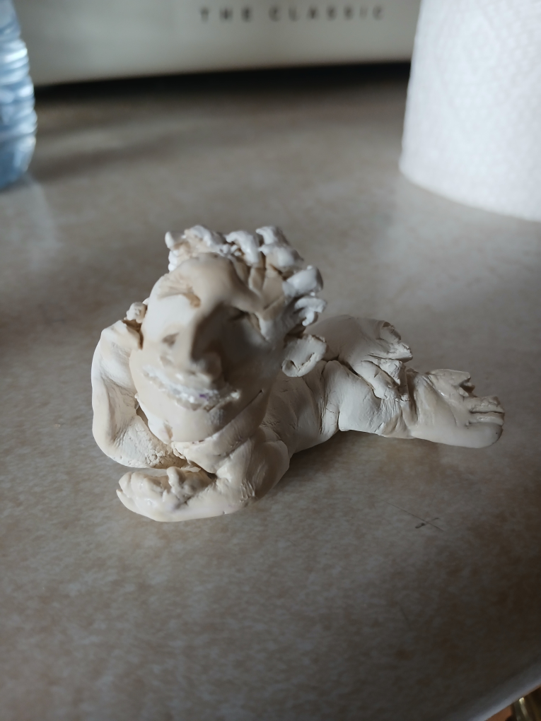 Whimsical Clay Figurine