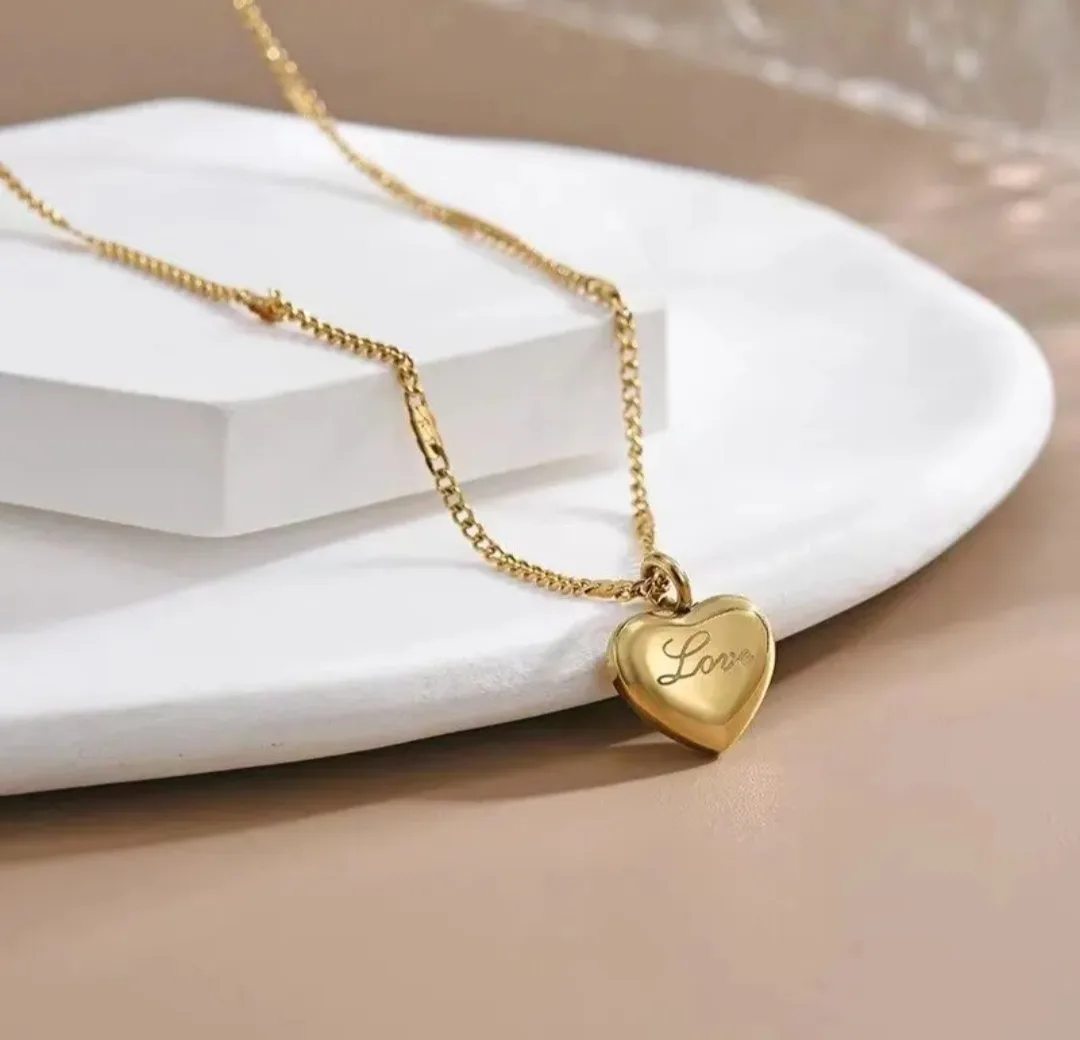 Gold Heart Necklace with 'Love' Inscription image indicator(2)