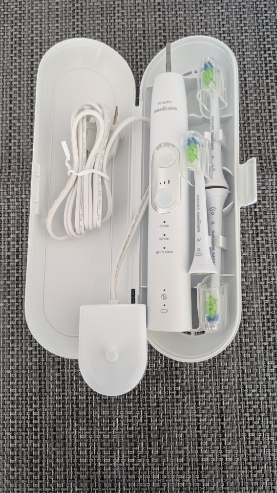 Philips Sonicare Electric Toothbrush w/ extra heads and case