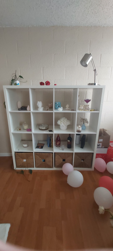 IKEA shelf with 4 storage boxes