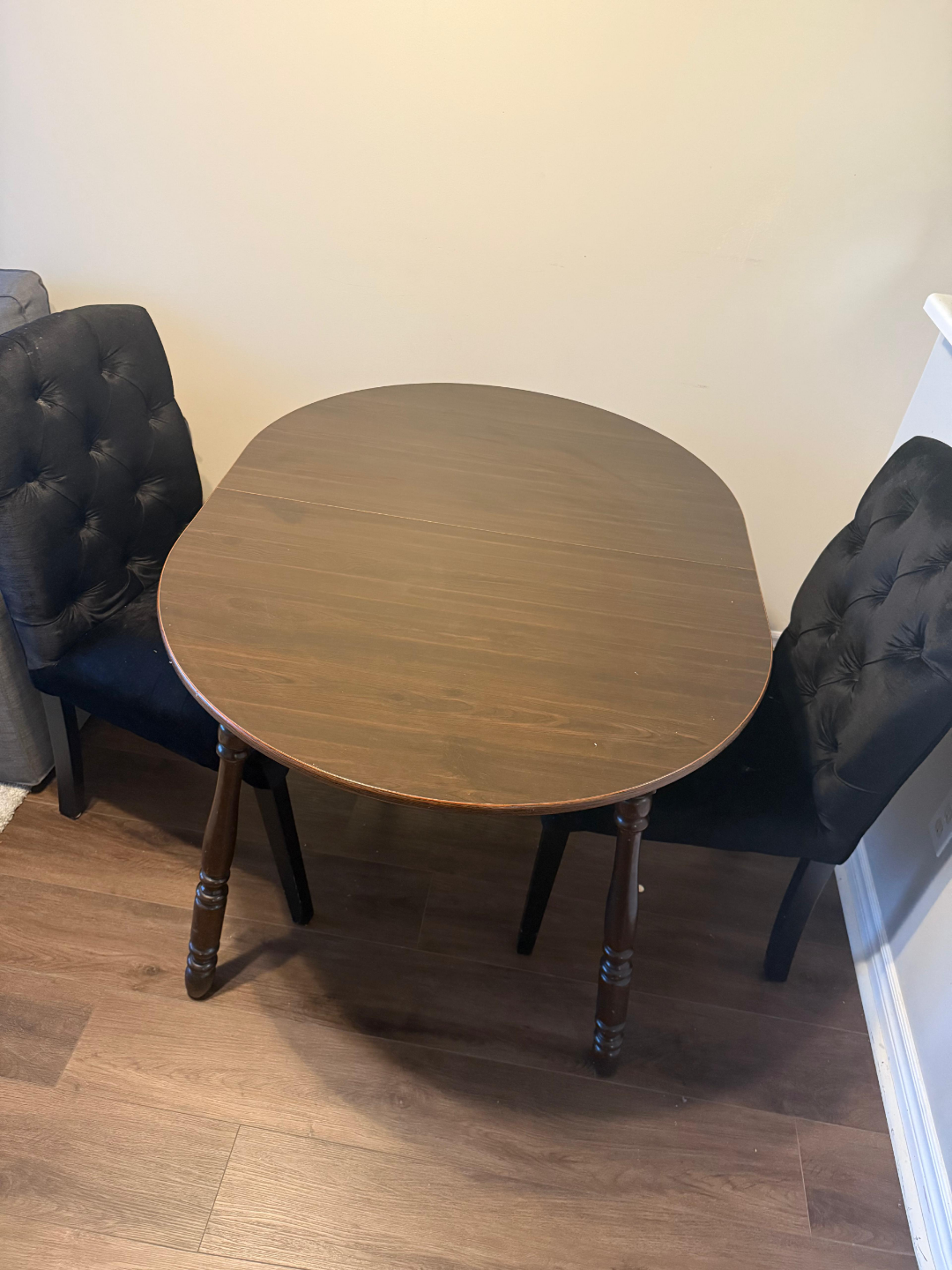 Small Oval shape dining table can fit four and two chairs