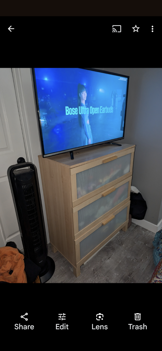 Three-drawer dresser with frosted glass fronts