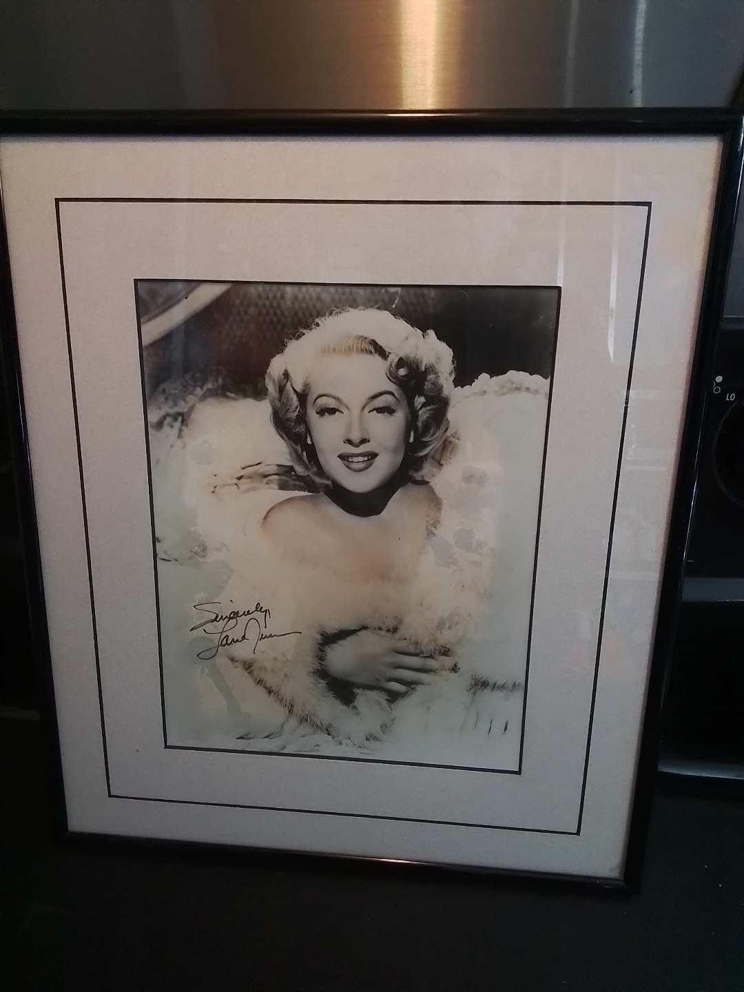 Framed autographed picture of Lana Turner