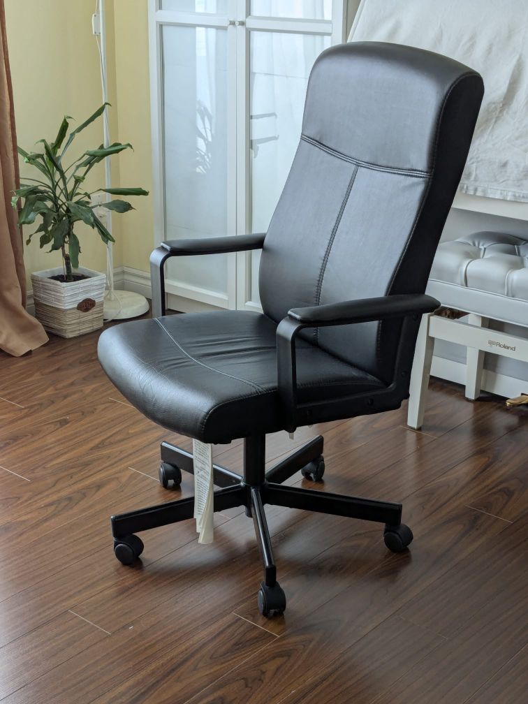 IKEA Black Faux Leather Office Chair with Wheels