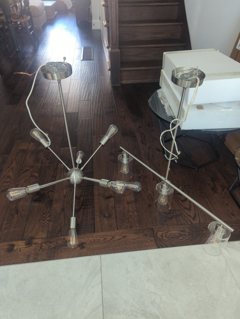 Two Modern Brushed Nickel Chandeliers