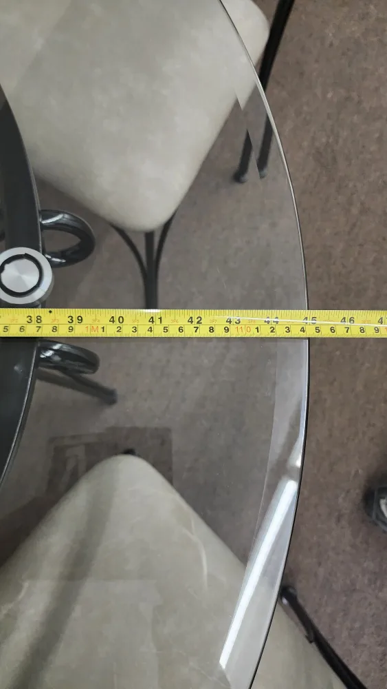 Glass-top dining table set with four chairs image indicator(3)