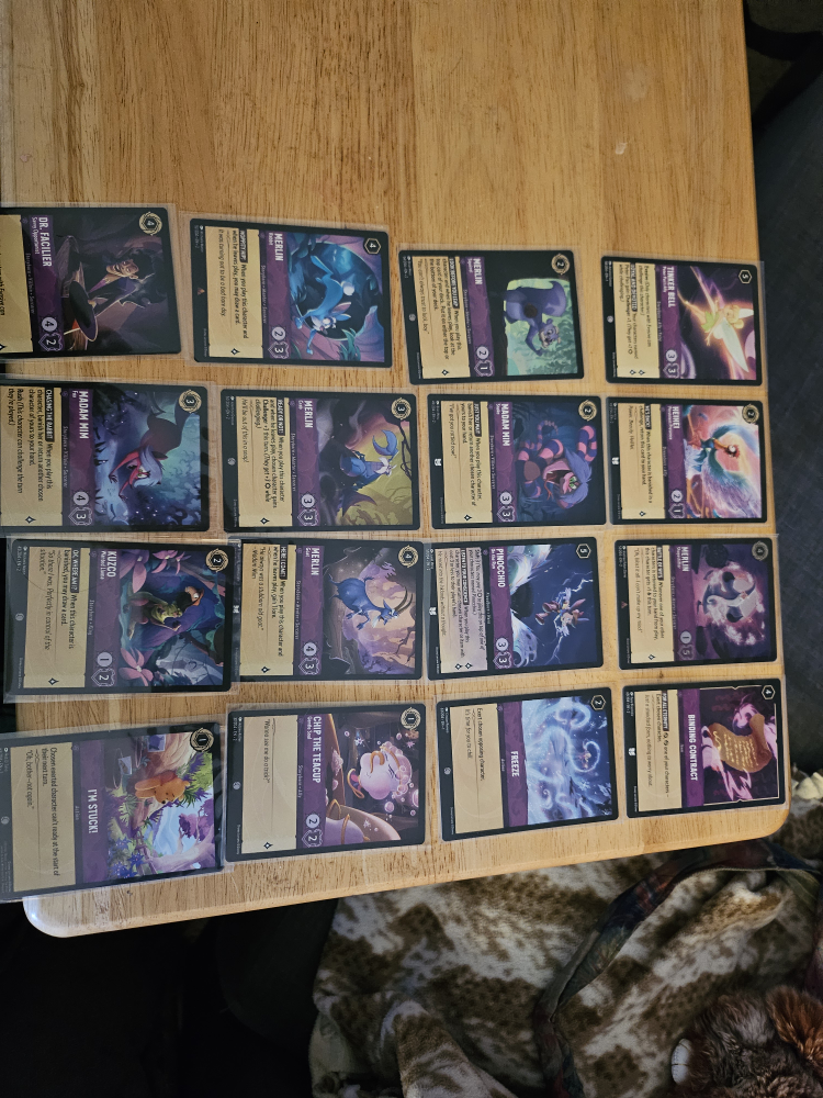 set of 16 Lorcana trading cards