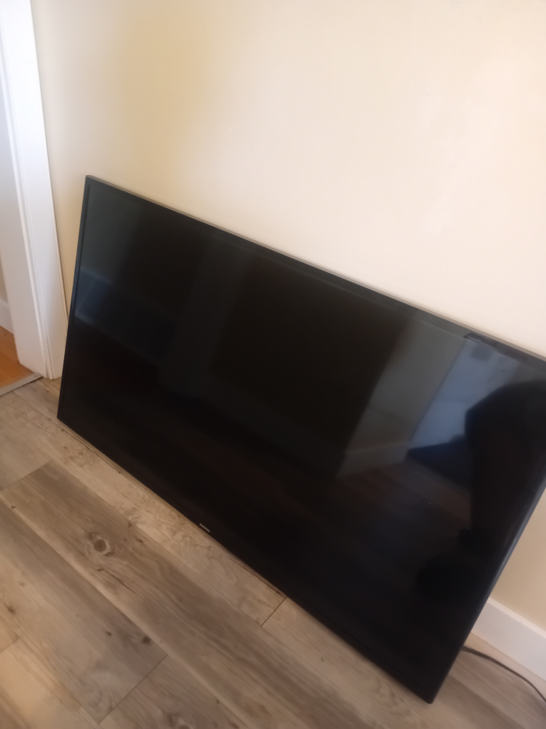 43" Samsung Smart TV (slight damage shown in pictures)