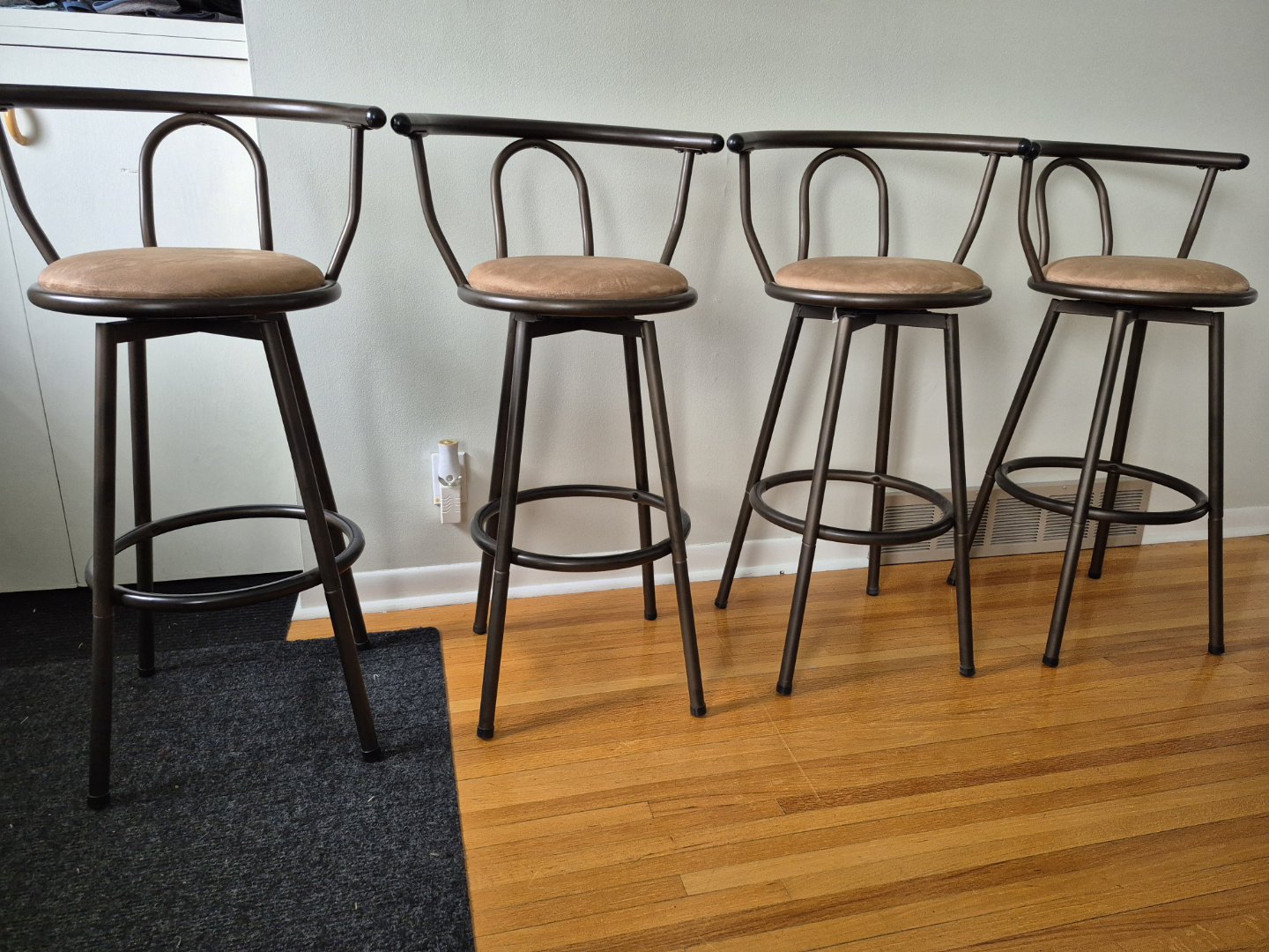Set of Four Metal Bar Stools with Tan Cushions