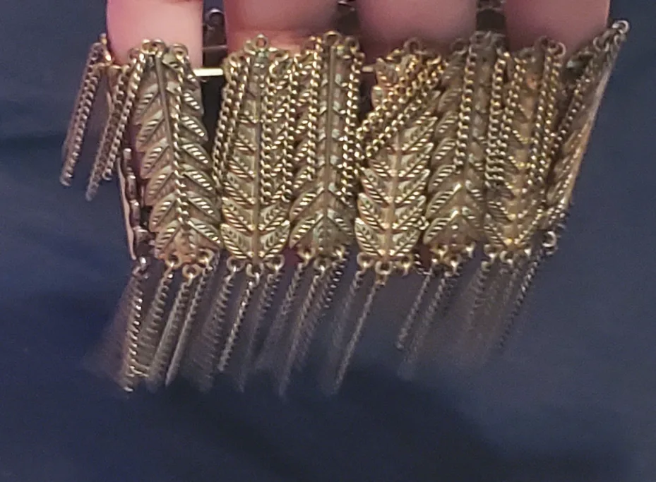 Gold Statement Bracelet with Leaf and Chain Detail image indicator(4)