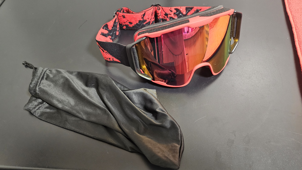 Red Ski Goggles with cloth bag.