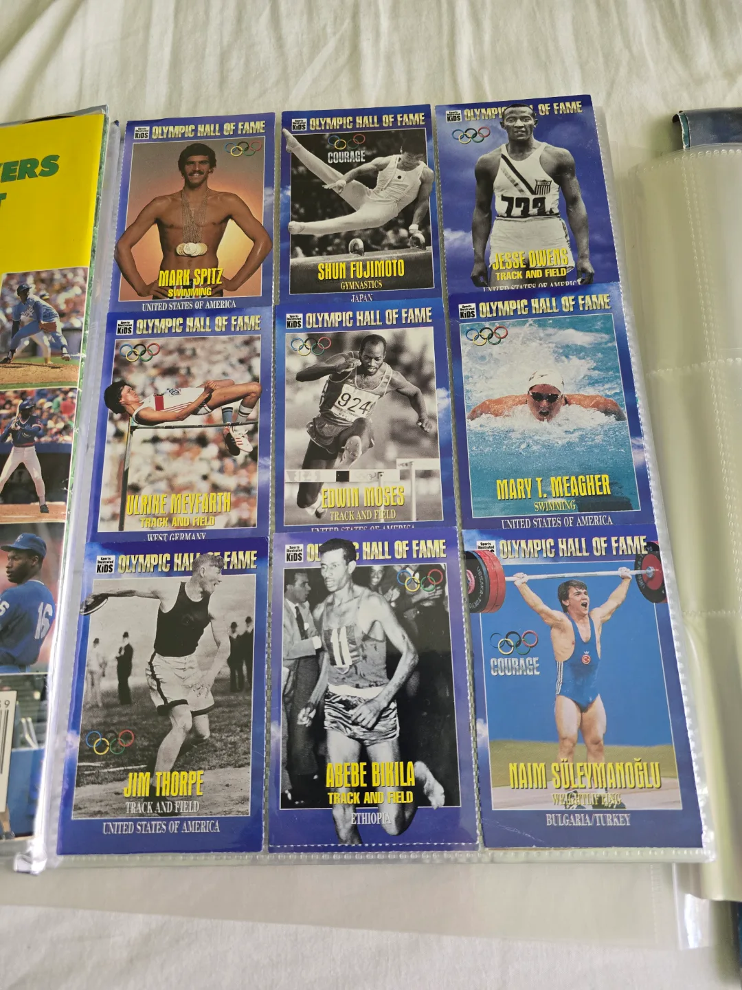 assorted sport posters, cards, pucks and games image indicator(4)