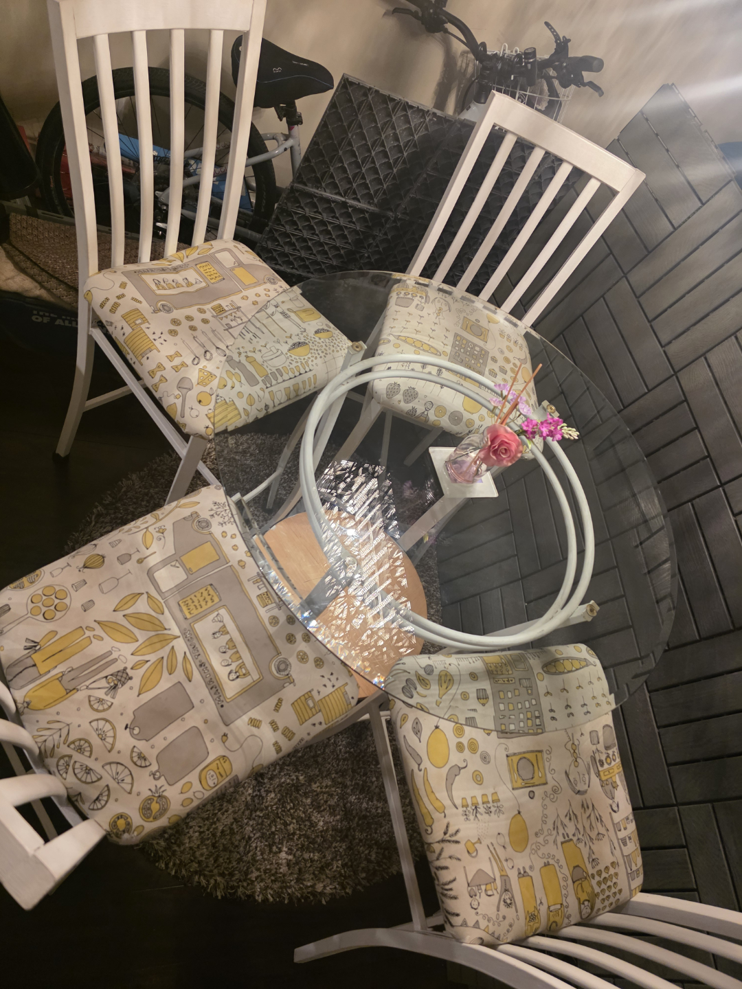 Glass-top kitchen table and four chairs