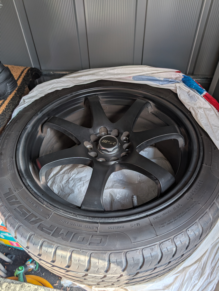 17 inch Black Aftermarket Wheels and Tires