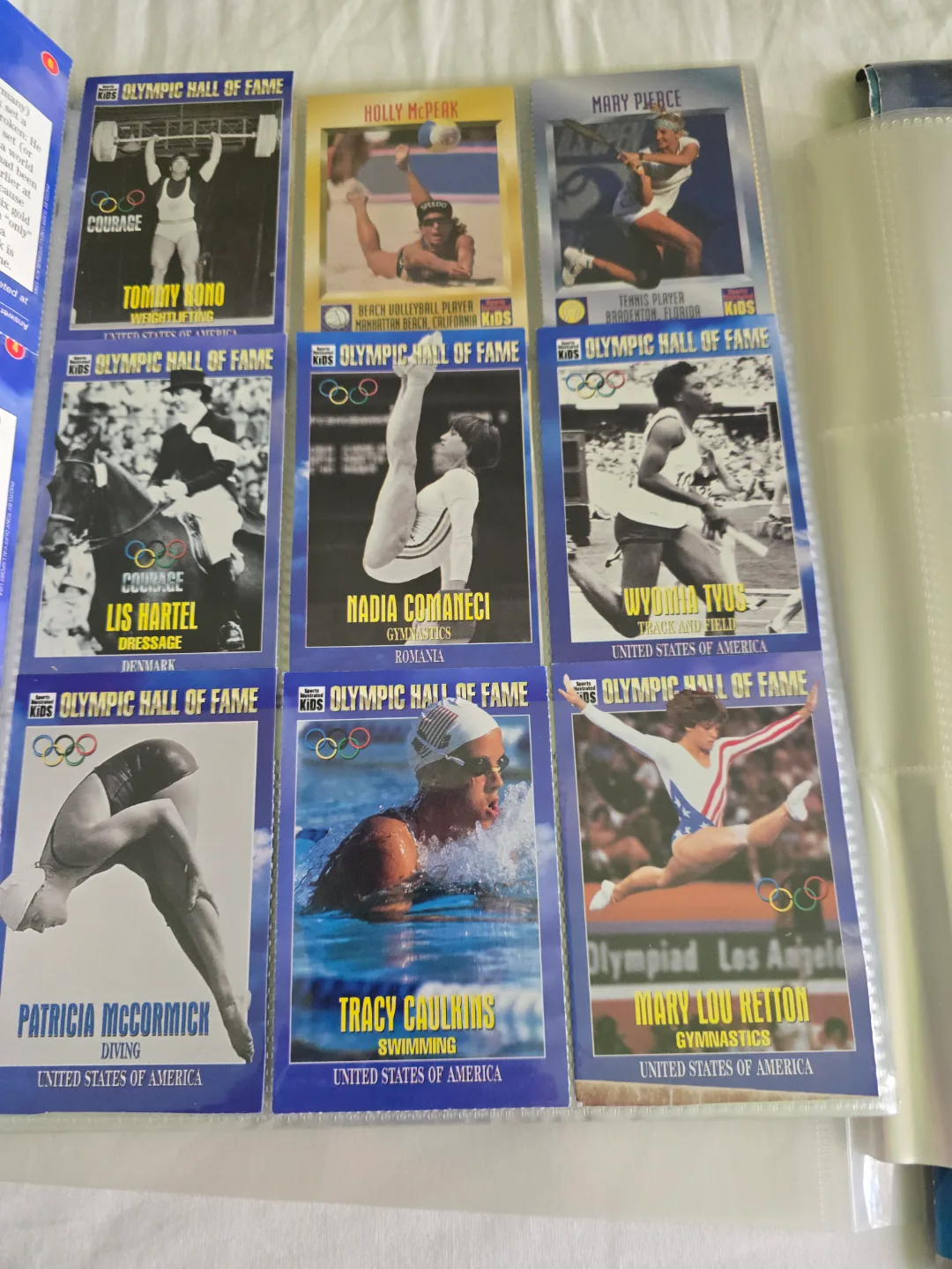 assorted sport posters, cards, pucks and games image indicator(7)