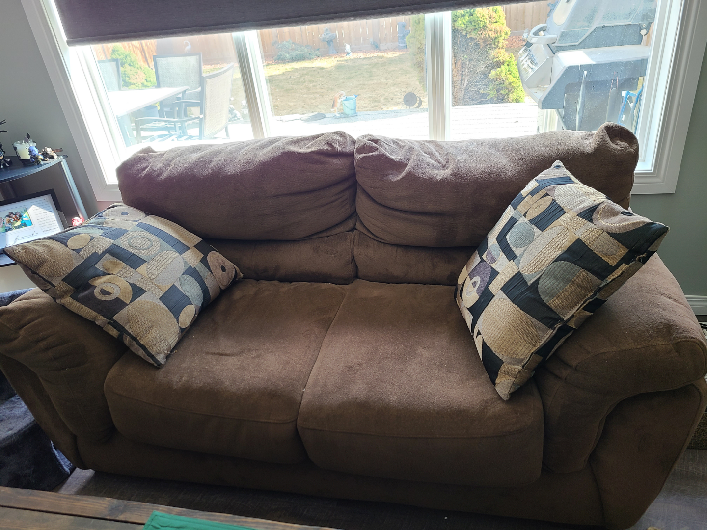 Brown Loveseat with Throw Pillows