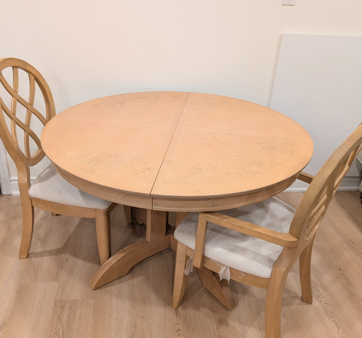 Round dining table set with two chairs