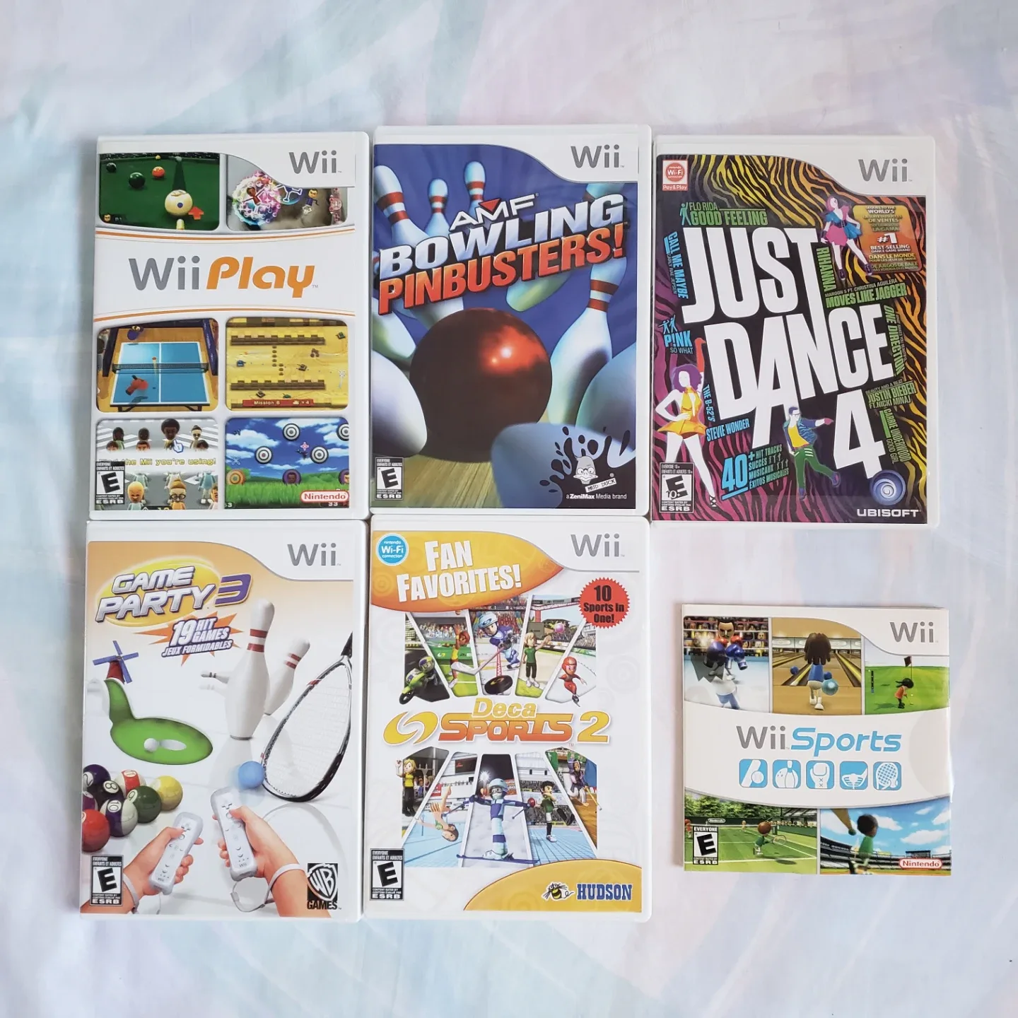 Nintendo Wii Console + 2 Remotes + 1 Nunchuk + 6 Games image indicator(2)