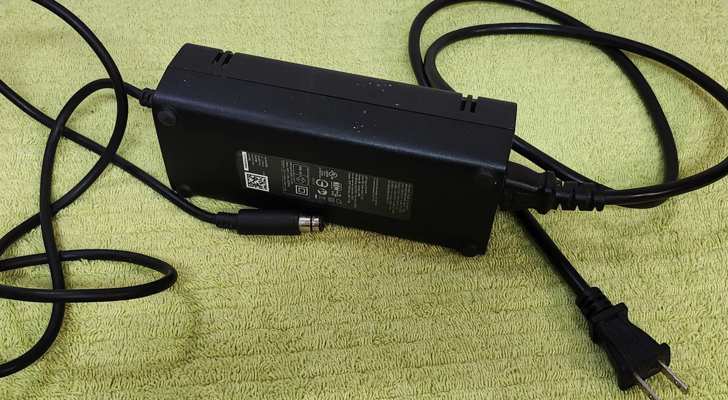 X box 360 e with all wires and wireless controller and 22 games image indicator(5)