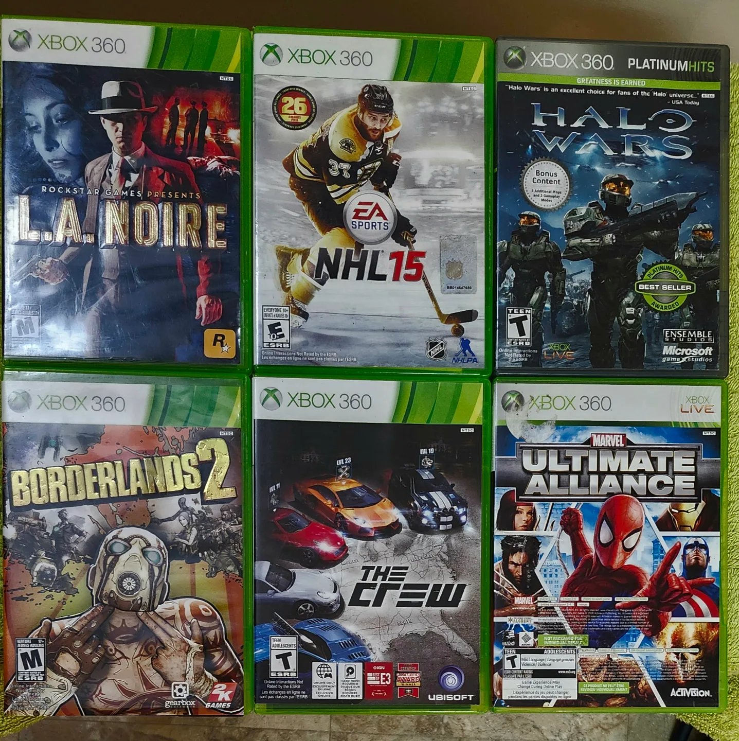 X box 360 e with all wires and wireless controller and 22 games image indicator(8)