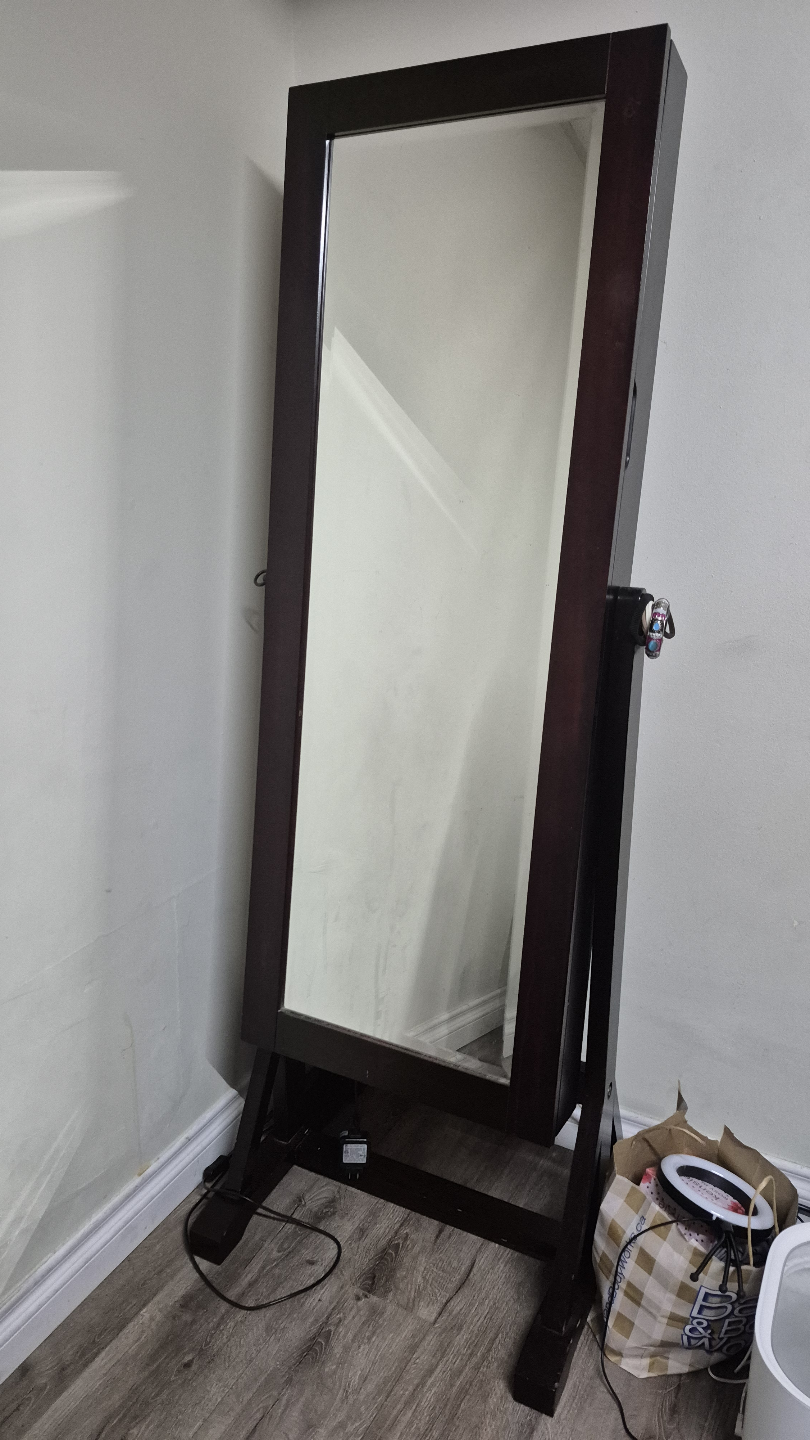 Full-length mirror with jewelry storage