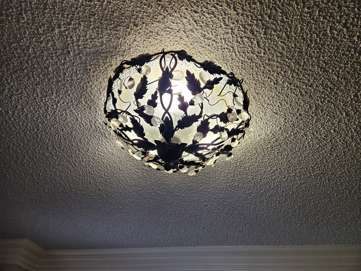 Elegant Black Metal and Crystal Chandelier image indicator(5)