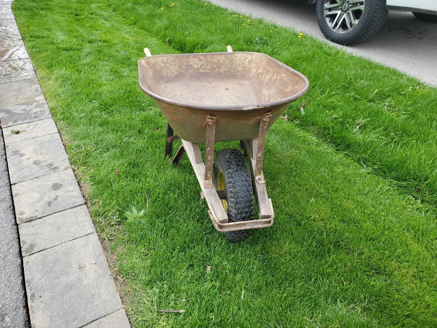 Vintage Metal Wheelbarrow with Wooden Handles thumbnail