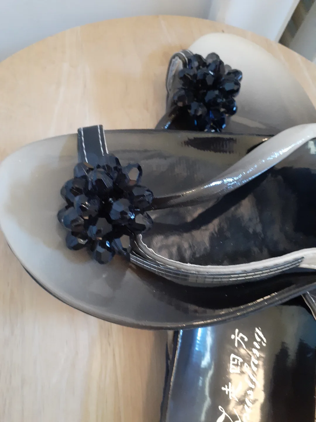 Stylish Black and Beige Embellished Flip-Flops image indicator(2)