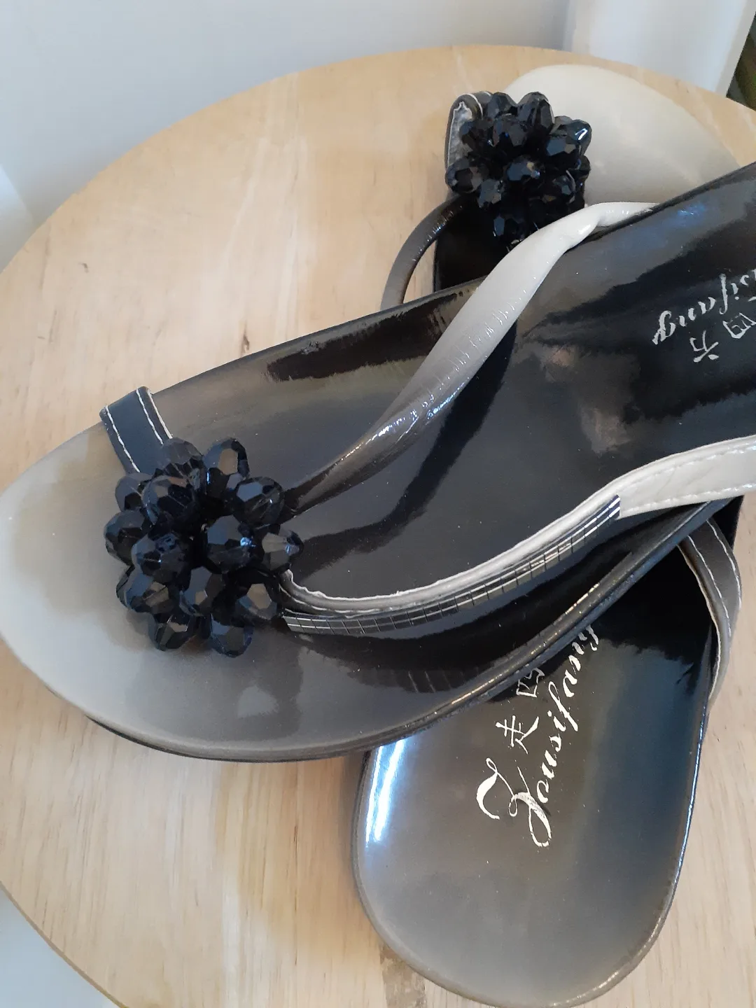 Stylish Black and Beige Embellished Flip-Flops image indicator(4)